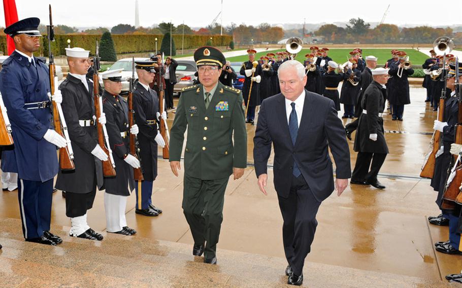 Chinese Gen. Xu Caihou arrives at the Pentagon last October for security talks with Defense Secretary Robert Gates. It was the last high-level meeting between the two militaries.