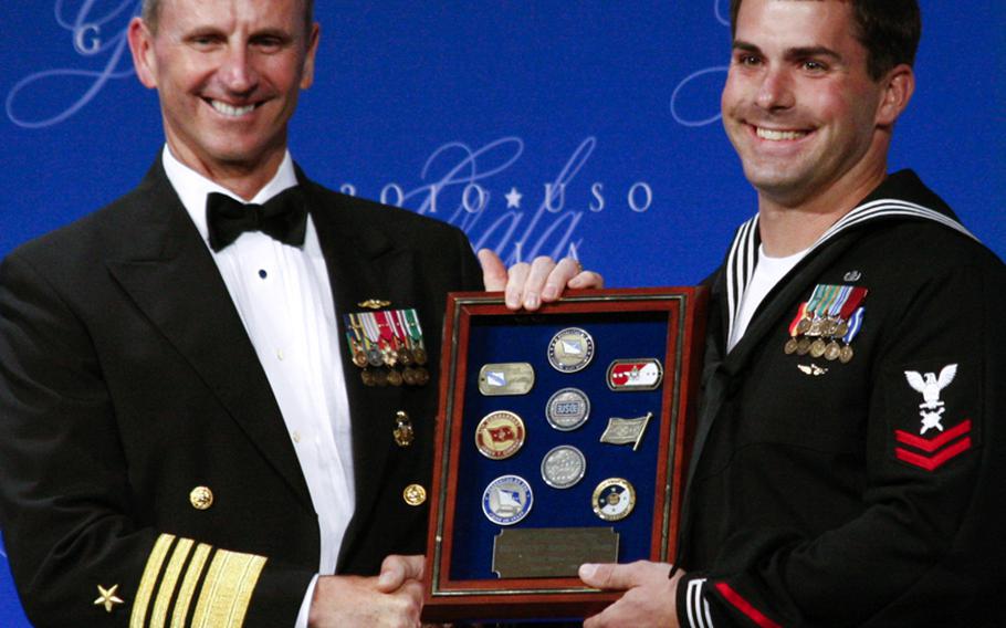 Vice Chief of Naval Operations Adm. Jonathan W. Greenert with USO Sailor of the Year Petty Officer 2nd Class Kenton J. Stacy.