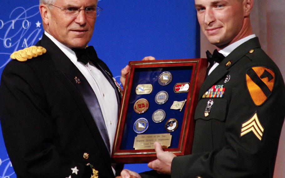 Army Chief of Staff George Casey with USO Soldier of the Year Sgt. Zachary B. Dispennette.