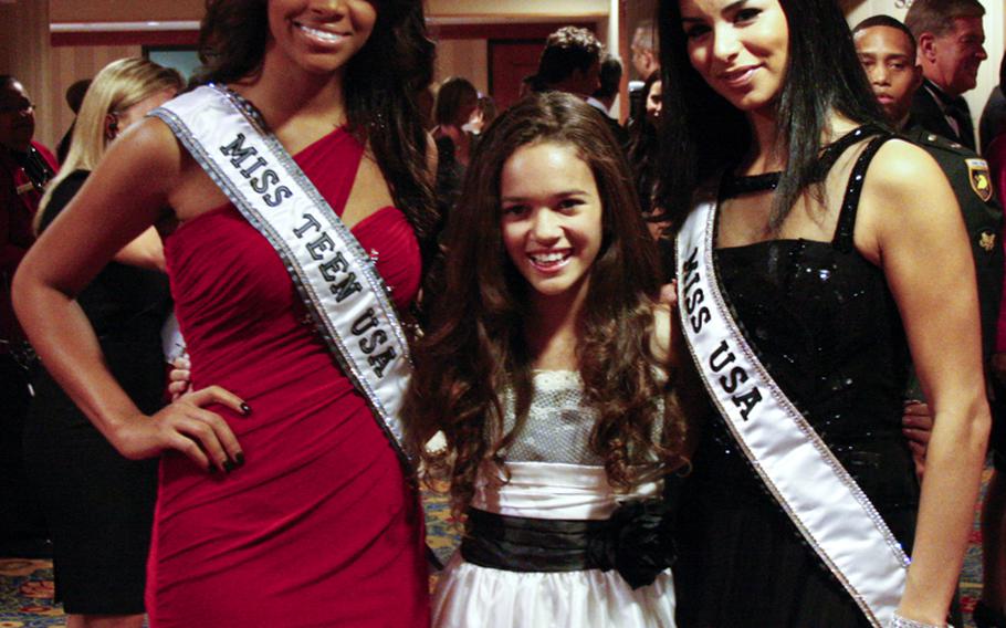 From left to right: Miss Teen USA Kamie Crawford, child actress Madison Pettis, and Miss USA Rima Fakih.