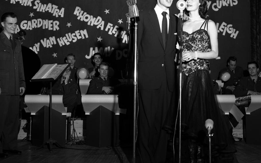 Frank Sinatra and Ava Gardner sing ''Bewitched, Bothered and Bewildered'' during the show at Wiesbaden.