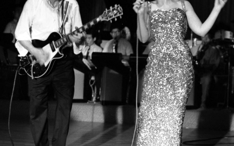 Les Paul and Arlene Carrol onstage at Grant Heights in 1965.