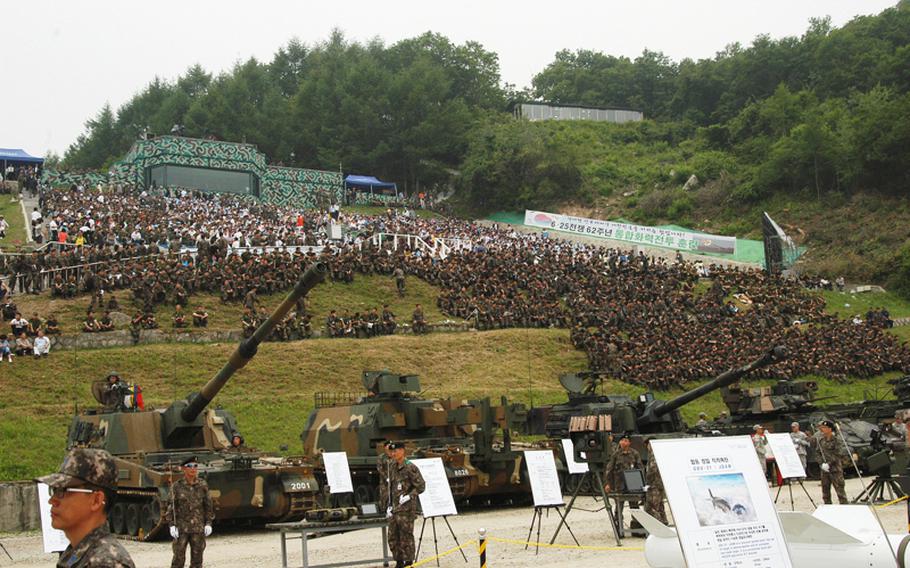 More than 4,000 spectators cover a hillside near Pocheon in South Korea on June 22, 2012, to watch a live-fire drill staged by the militaries of the U.S. and South Korea about 15 miles south of the Demilitarized Zone.   
