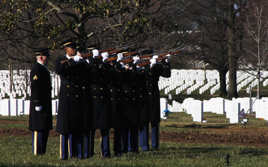 A firing party fires three rifle volleys at the funeral of Army Capt. Andrew M. Pedersen-Keel at Arlington National Cemetery on March 27, 2013. Pedersen-Keel was killed March 11 in an insider attack in Afghanistan.
