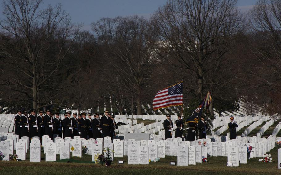 Taps is played at the funeral of Army Capt. Andrew Pedersen-Keel at Arlington National Cemetery on March 27, 2013. Pedersen-Keel was killed March 11 in an insider attack in Afghanistan.