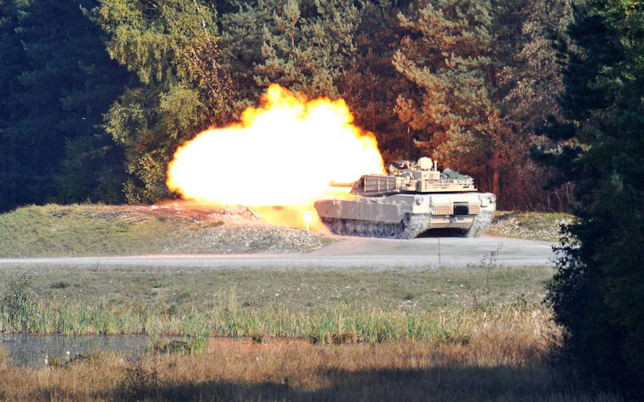 U.S. Army soldiers of Alpha Company, 3rd Battalion 66th Armor Regiment, Task Force 1-2, 172nd Infantry Brigade conduct a live fire training exercise with M1 Abrams tanks at Grafenwoehr Training Area, Germany in this Oct. 2010 photo.