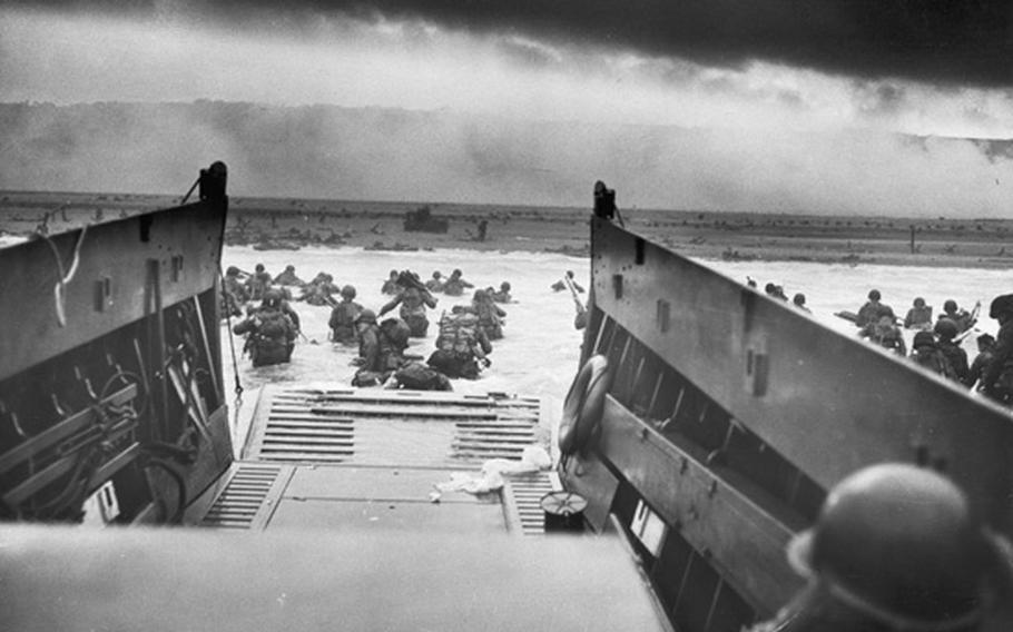 American troops move toward shore during the D-Day invasion, June 6, 1944.