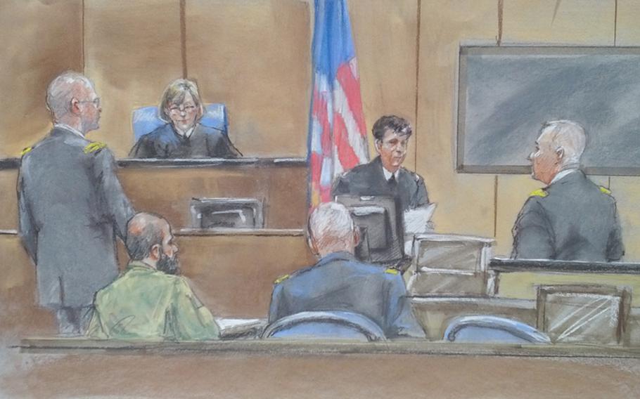 In this sketch by courtroom artist Brigitte Woosley, Air Force Lt. Col. Edward Mazuchowski testifies Aug. 14, 2013, in the ongoing trial of Maj. Nidal Hasan. Mazuchowski is a forensic pathologist who performed autopsies on two of the victims of the Nov. 5, 2009 shooting at Ft. Hood. 