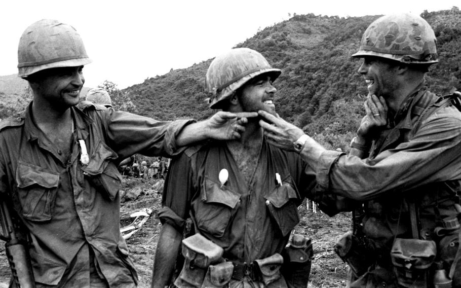 Soldiers compare beards during Operation Hawthorne in 1966.