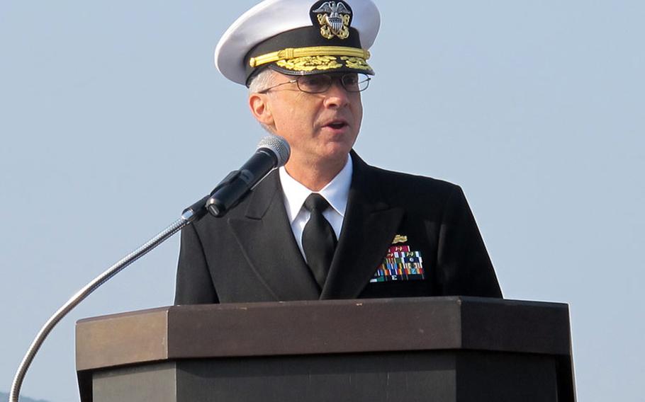 Rear Adm. Hugh Wetherald, commander Amphibious Forces 7th Fleet, presided over a change-of-command ceremony for the USS Ashland Friday, Jan. 17, 2014, at Sasebo Naval Base, Japan.