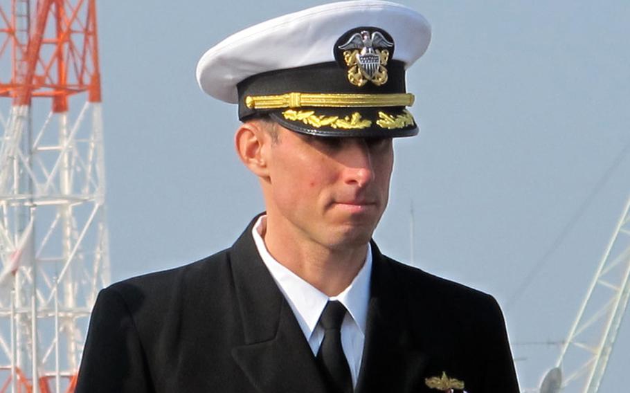 Cmdr. John Barnett relinquished command of the Whidbey Island-class amphibious dock landing ship USS Ashland during a change-of-command ceremony Friday, Jan. 17, 2014, at Sasebo Naval Base, Japan. He was replaced by the ship's executive officer, Cmdr. Douglas Patterson.