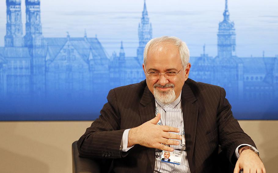 Iran's Foreign Minister Mohammad Javad Zarif listens during  a panel discussion at  the 50th Security Conference on security policy in Munich, Germany, Sunday, Feb. 2, 2014.