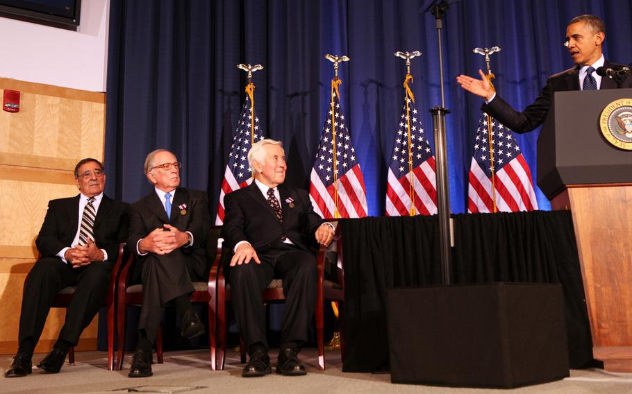 U.S. President Barack Obama delivers remarks to the Nunn-Lugar Cooperative Threat Reduction symposium at the National Defense University for the 20th anniversary of the CTR program while then Secretary of Defense Leon Panetta, left, former Senator Sam Nunn, second from left, and Senator Dick Lugar, second from right, listen in Washington, D.C., Dec. 3, 2012. In his speech, the president acknowledged the extraordinary progress made in securing nuclear material, and thanked Senators Nunn and Lugar for their works on those issues.