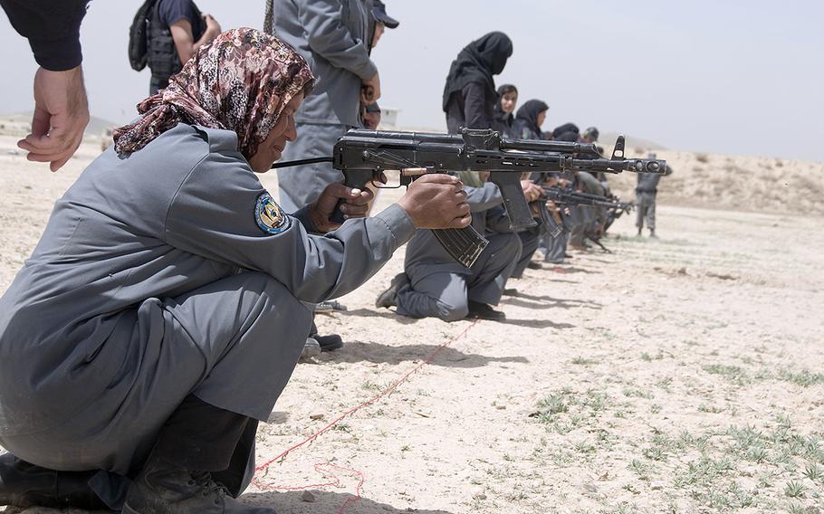 Afghan national police women qualify on the AK-47 rifle during the tactical training program portion of the police basic training course at Kabul Military Training Center, April 13, 2010. 