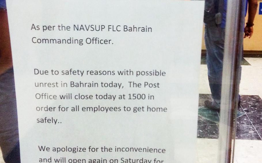 A sign at the post office on Naval Support Activity Bahrain informs customers that it would be closing early Feb. 13, 2014, for safety reasons in anticipation of increased political unrest.

Hendrick Simoes/Stars and Stripes