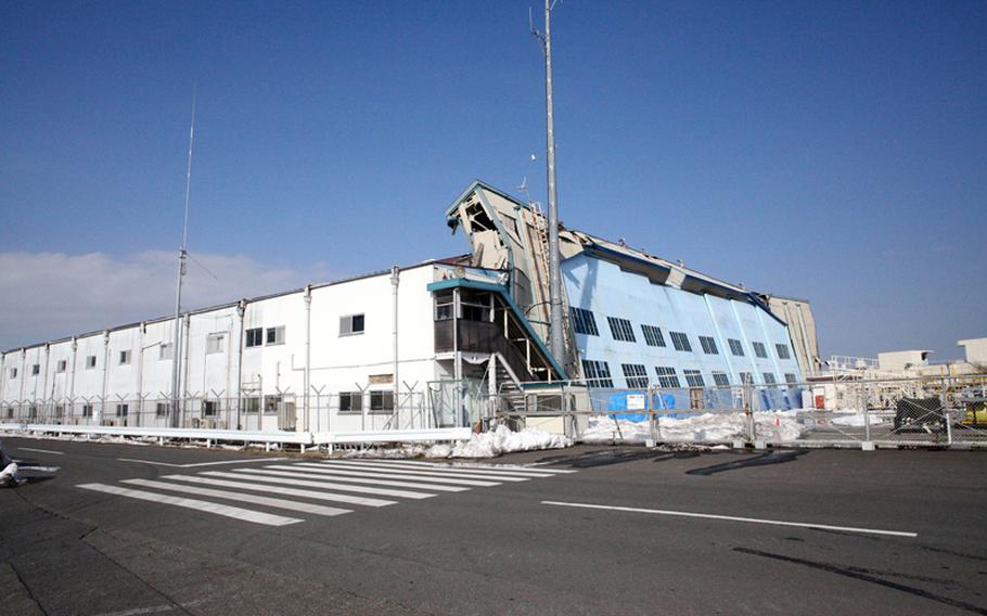A hangar owned by NIPPI Corporation with U.S. and Japanese owned P-3 Orion surveillance aircraft inside collapsed near Naval Air Facility Atsugi last weekend from heavy snow.