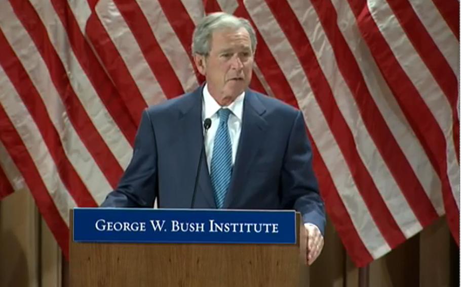 Former President George W. Bush gives remarks during the Bush Institute's Military Service Initiative Feb. 19, 2014.