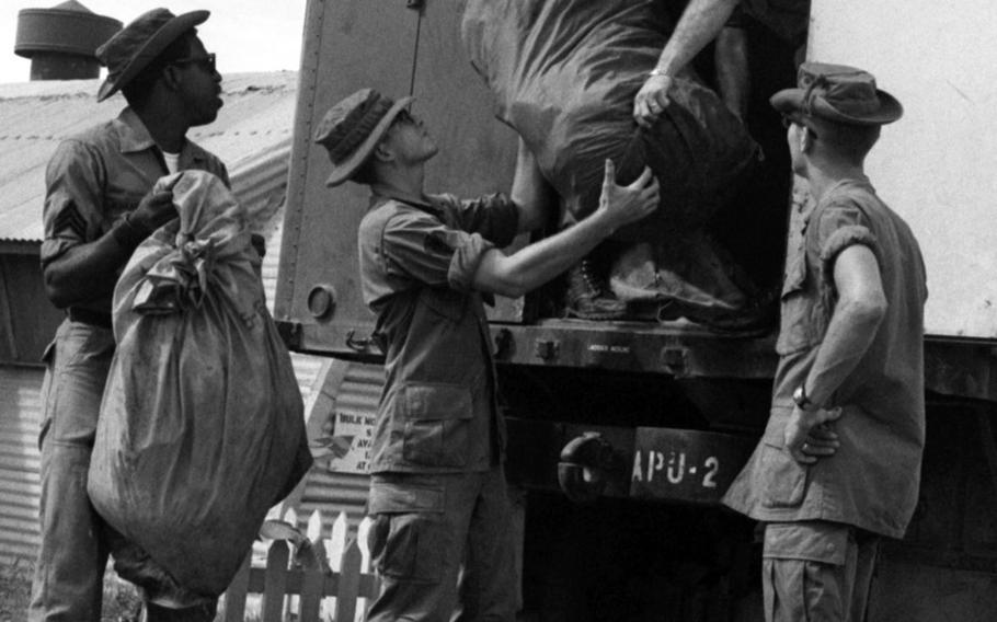 Soldiers from the 41st Army Postal Unit (Airmobile) load mail onto a truck at Tay Ninh in 1968.