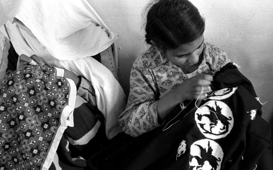 A sewing class at Camp Jabaliya, one of the refugee settlements on the Gaza Strip, in February, 1958.