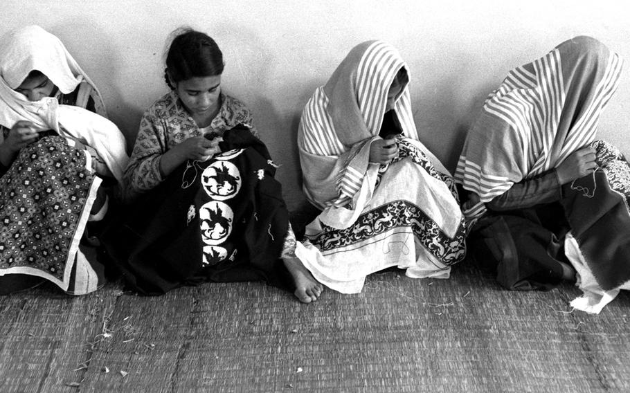 A sewing class at Camp Jabaliya, one of the refugee settlements on the Gaza Strip, in February, 1958.