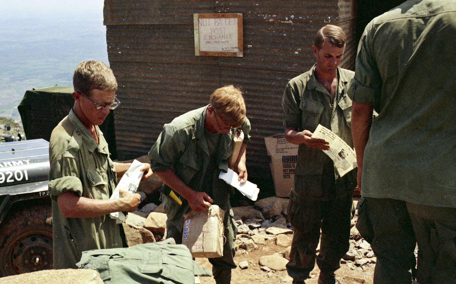 Soldiers on Nui Ba Den (Black Virgin Mountain), Vietnam, in 1969 get supplies, mail and copies of Stars and Stripes.