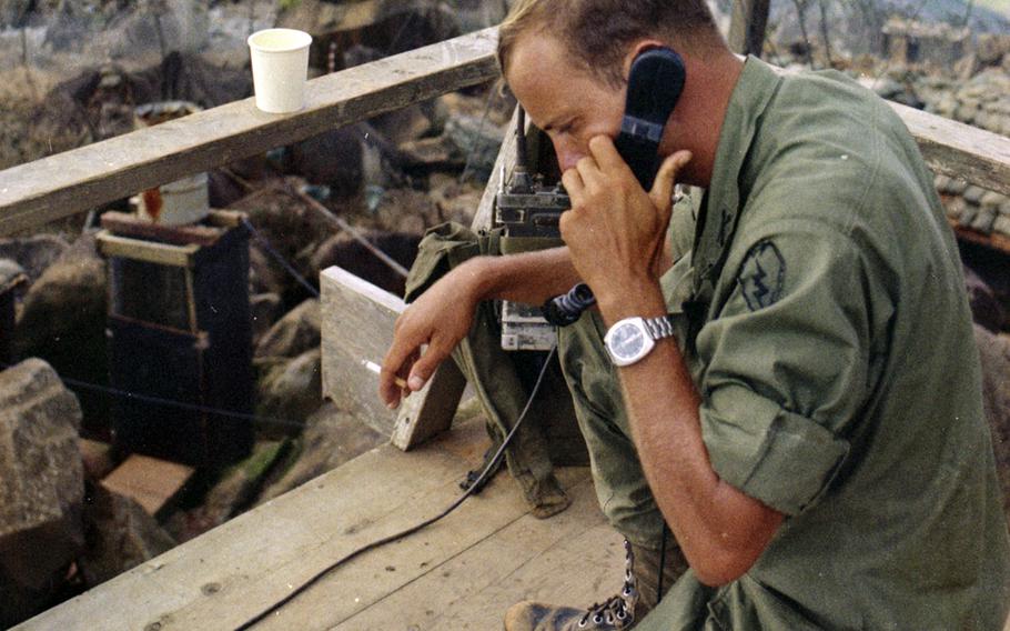 From his vantage point at the radio relay station atop 3,200-foot Nui Ba Den mountain in October, 1969, 1st Lt. John Lowe of Columbus, Ohio, an artillery officer with 3rd Battalion, 22nd Infantry, 25th Infantry Division, spends his day calling in artillery strikes on the surrounding flatlands and hills.