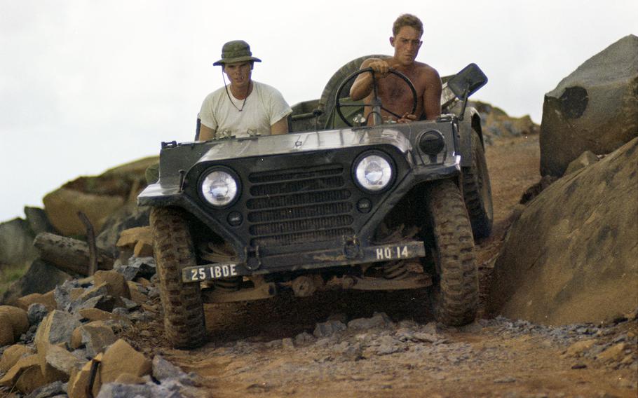 A soldier carefully steers a jeep dowm a narrow path on Nui Ba Den (Black Virgin Mountain), Vietnam, in 1969.