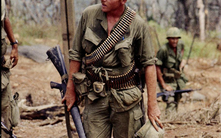 Soldiers return from a patrol on Nui Ba Den (Black Virgin Mountain), Vietnam, in 1969.