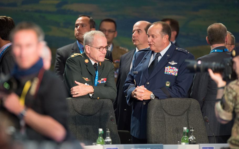 On Sept. 4, 2014, Gen. Phil Breedlove (right), Supreme Allied Commander Europe, speaks with Gen. Knud Bartels (left), Chairman of the NATO military Committee, just before the meeting on Afghanistan kicks off at NATO Summit 2014 in the Wales, United Kingdom.