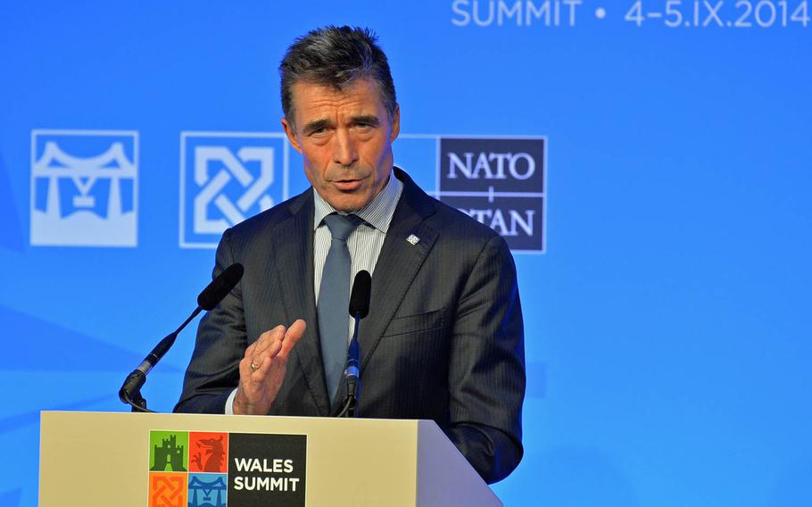 NATO Secretary General Anders Fogh Rasmussen speaks to the media at Celtic Manor in Newport, Wales, Thursday Sept. 4, 2014, during the NATO summit. NATO leaders discussed the future of the alliance in Afghanistan.
