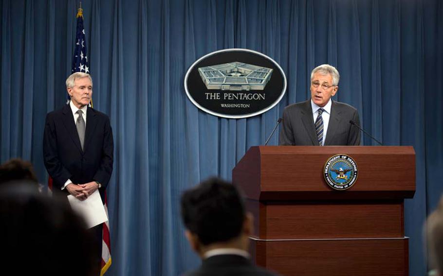Secretary of Defense Chuck Hagel, right, and Secretary of the Navy Ray Mabus address reporters during a news conference March 18, 2014, at the Pentagon in Arlington, Va., to discuss new security actions resulting from the investigation of the Washington Navy Yard shootings in September 2013.