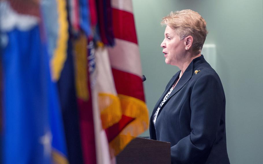 Newly commissioned Undersecretary of Defense for Personnel and Readiness Jessica Wright delivers remarks during a ceremony hosted by Secretary of Defense Chuck Hagel at the Pentagon in Arlington, Va., Aug. 4, 2014.