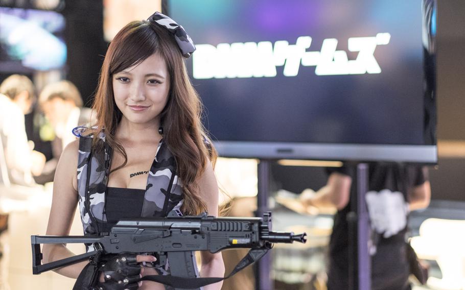 A cosplay actress for DMM.com poses at the Tokyo Game Show Sept. 18, 2014, in Makuhari, Japan.