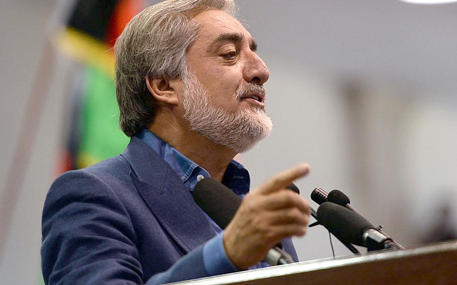 Afghan presidential candidate Abdullah Abdullah speaks to supporters at a meeting in Kabul in July, 2014.