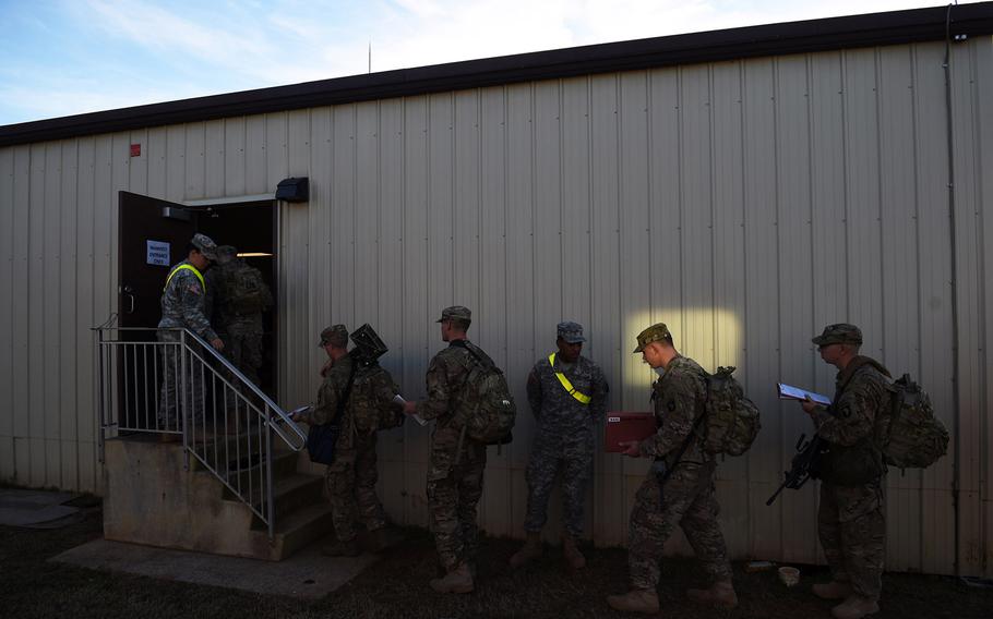 Army soldiers line up for deployment to Afghanistan on Nov. 9, 2014 in Fort Campbell, Kentucky. 