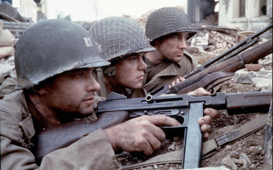 From left, Tom Hanks as Captain Miller, Matt Damon as Private Ryan and Edward Burns as Private Reiben are seen in a scene from DreamWorks Pictures' and Paramount Pictures' "Saving Private Ryan." 