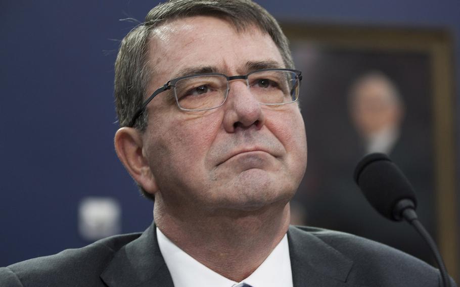 Secretary of Defense Ashton Carter listens to the opening statements during a Capitol Hill hearing on Mar. 4, 2015.