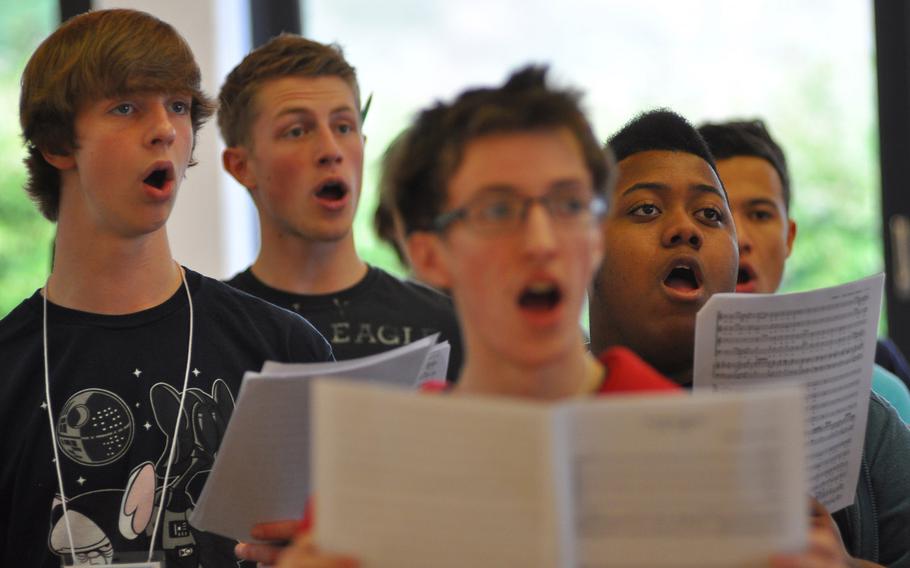 Student vocalists, from left, Ramstein's Aaron Young, Kaiserslautern's Caleb Chastain, Lakenheath's Quintin Pitts and Ramstein's Shamar Armprester sing Mozart's ''Veni Sancte Spiritus'' during rehearsals Tuesday for the annual DODDS-Europe Honors Music Festival. This year, 154 students were selected to participate.