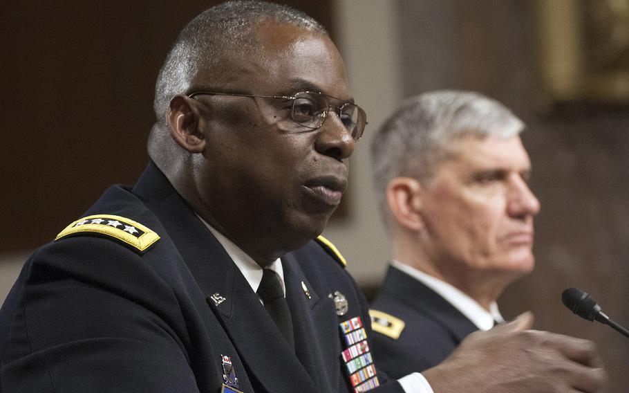 Gen. Lloyd J. Austin, commander of the U.S. Central Command, answers a question during a Senate Armed Services Committee budget hearing Thursday, March 26, 2015, in Washington. Next to him is AFRICOM commander Gen. David M. Rodriguez. Austin told lawmakers that there were a number of preconditions that had to be met before the U.S.-led coalition would come to the rescue of the stalled offensive in Tikrit.