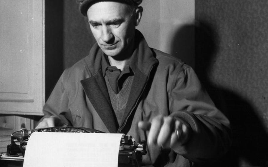 Ernie Pyle sits at his typewriter in this undated photo from World War II.