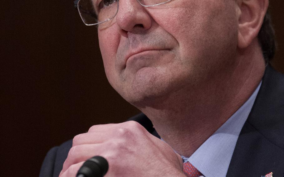 Secretary of Defense Ash Carter listens to opening statements during a Senate Appropriations subcommittee budget hearing on Capitol Hill, May 6, 2015.