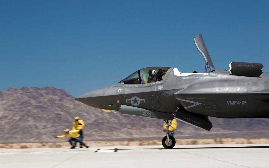 An F-35B Lightning II with Marine Fighter Attack Squadron 121 from Marine Corps Air Station Yuma, Ariz., performs a short takeoff as part of required training at the station's auxiliary landing field, Monday, April 27, 2015. The landing field simulates the flight deck of an aircraft carrier.
