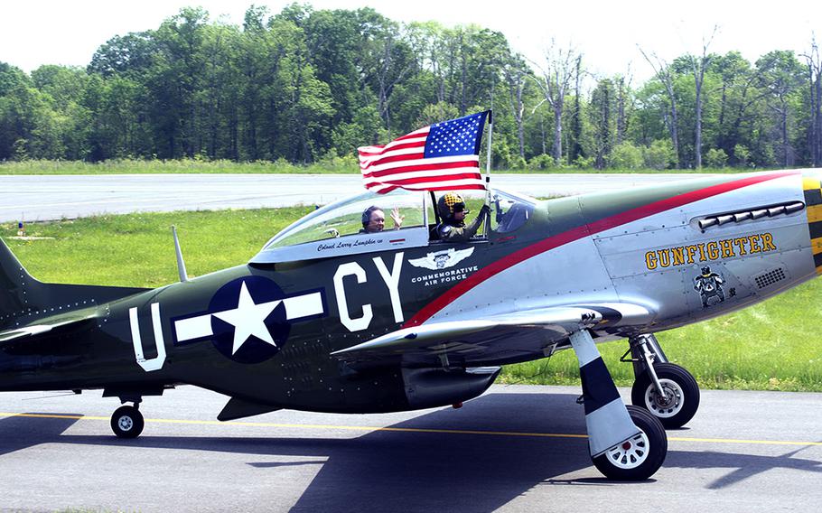 A pilot lands his plane at the Culpeper Regional Airport Thursday, May 7, during the preview for the Arsenal of Democracy: World War II Victory Capitol Flyover.