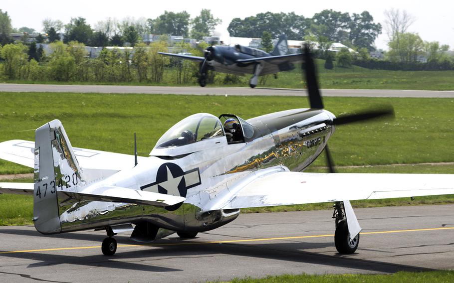 Pilots land their planes at the Culpeper Regional Airport Thursday, May 7, during the preview for the Arsenal of Democracy: World War II Victory Capitol Flyover.