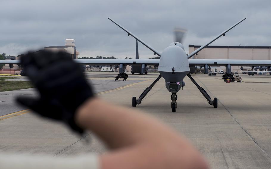 An MQ-9 Reaper taxis during an operations check in preparation for Emerald Warrior 2015 at Hurlburt Field, Fla., April 18, 2015.