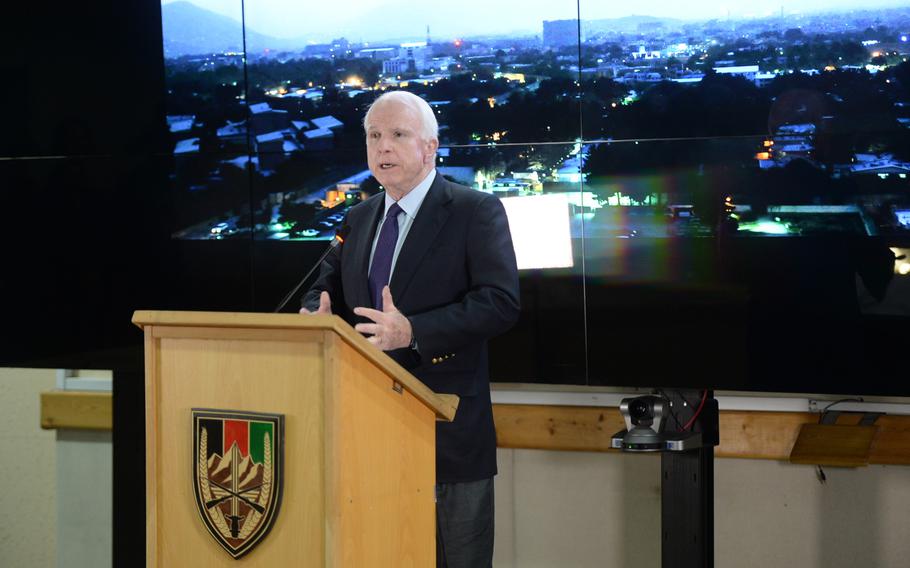 Sen. John McCain, R-Ariz., fields questions from reporters during a July 4, 2015 press conference at NATO headquarters in Kabul, Afghanistan. McCain said that the Obama administration must reassess plans to withdrawal U.S. forces from the country in 2016.

