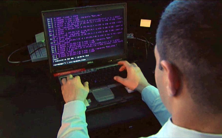 This video screen grab shows Department of Defense personnel receiving training to defend against cyber attacks. 