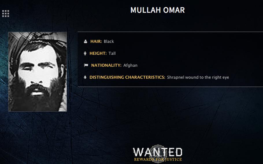 In this image released by the FBI, Mullah Mohammed Omar is seen in a wanted poster. The reclusive Afghan Taliban leader has backed peace talks with the Kabul government, saying in a rare message distributed to media Wednesday, July 15, 2015 that the goal of these efforts is an "end to occupation" by foreign forces.