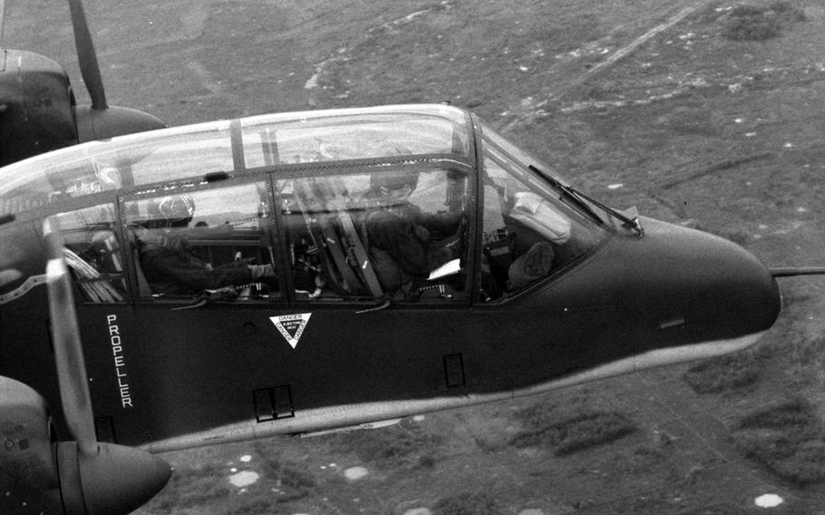 A look inside the cockpit of an OV-10 Bronco aircraft from Marine Observation Squadron 2 as it flies over the An Hoa Basin, about 15 miles southeast of Da Nang, during Operation Taylor Common 2 in December, 1968.