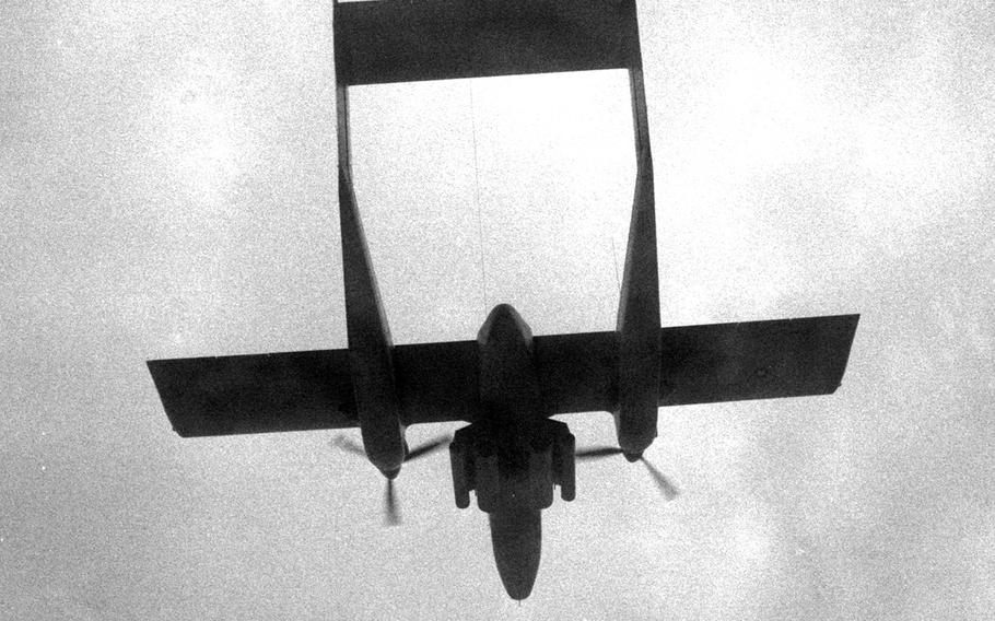 The distinctive silhouette of an OV-10 Bronco over South Vietnam in December, 1968.